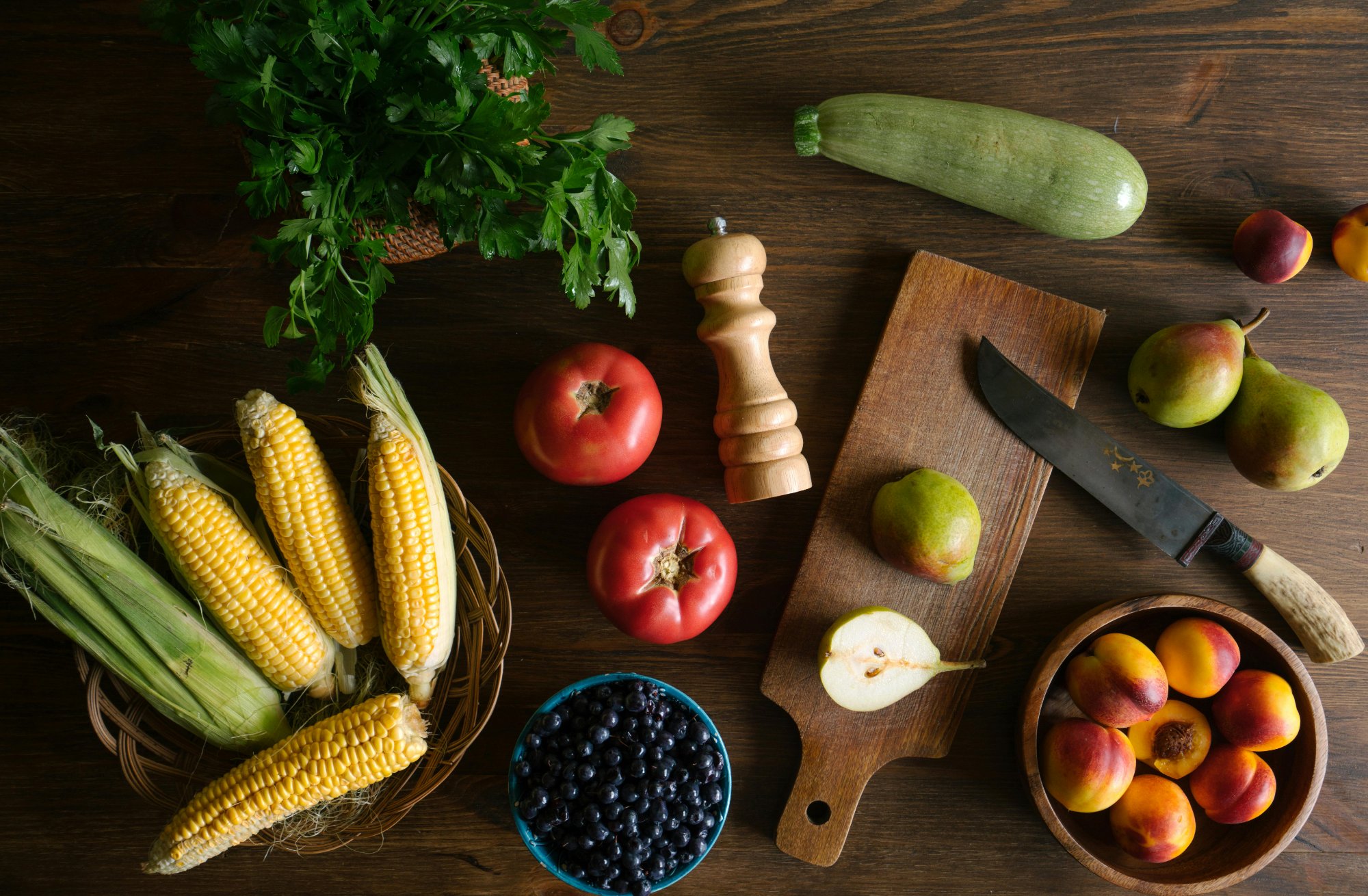 Fresh whole foods on a wooden table