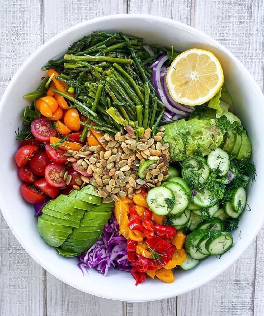 Colorful whole food bowl with fresh vegetables